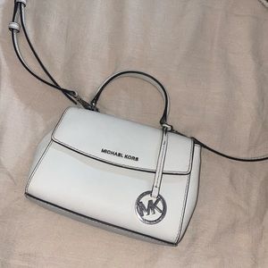 White Michael Kors purse with crossbody strap
